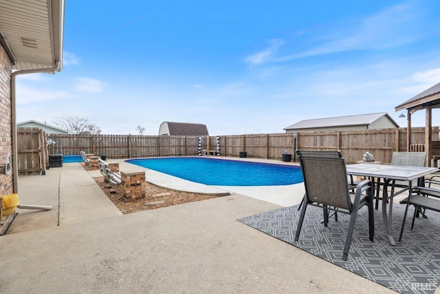 1689 E 550 Rd S, Peru, IN 46970 - view of pool with a fenced backyard, a fenced in pool, outdoor dining space, and a patio