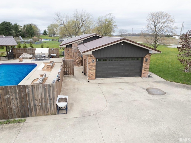 1689 E 550 Rd S, Peru, IN 46970 - view of pool featuring a yard, a fenced in pool, and fence