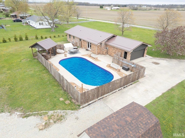 1689 E 550 Rd S, Peru, IN 46970 - view of pool with fence private yard, a gazebo, a yard, and an outbuilding