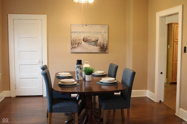 1185 N 10th St, Noblesville, IN 46060 - dining area featuring baseboards and dark wood-style floors