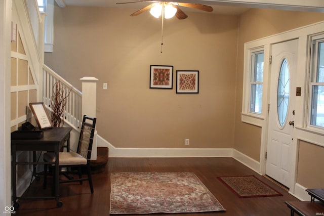 1185 N 10th St, Noblesville, IN 46060 - entryway with baseboards, a ceiling fan, wood finished floors, and stairs