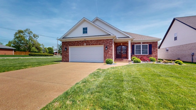 3512 Forestdale Dr, Newburgh, IN 47630 - view of front of property featuring driveway, a front lawn, brick siding, and a garage