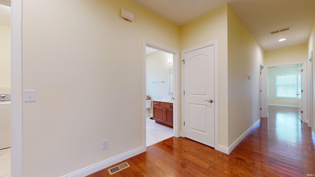 3512 Forestdale Dr, Newburgh, IN 47630 - corridor with baseboards, light wood-style flooring, and visible vents