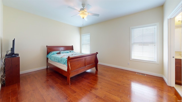 3512 Forestdale Dr, Newburgh, IN 47630 - bedroom featuring ceiling fan, baseboards, visible vents, and light wood-style flooring