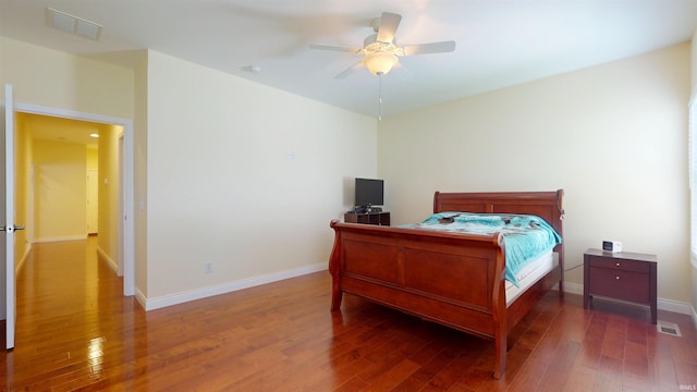 3512 Forestdale Dr, Newburgh, IN 47630 - bedroom with baseboards, wood finished floors, and visible vents