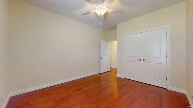 3512 Forestdale Dr, Newburgh, IN 47630 - unfurnished bedroom featuring wood finished floors, a closet, baseboards, and ceiling fan
