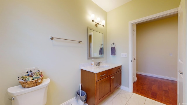 3512 Forestdale Dr, Newburgh, IN 47630 - bathroom with baseboards, vanity, and toilet