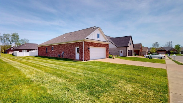 3512 Forestdale Dr, Newburgh, IN 47630 - view of home's exterior featuring brick siding, a lawn, concrete driveway, and fence