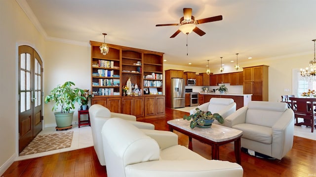 3512 Forestdale Dr, Newburgh, IN 47630 - living room with ceiling fan with notable chandelier, dark wood-type flooring, and crown molding