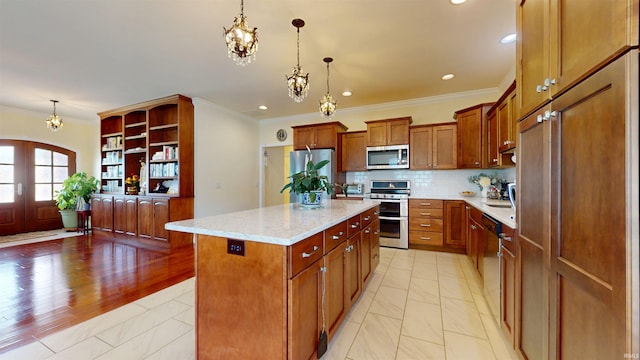3512 Forestdale Dr, Newburgh, IN 47630 - kitchen featuring brown cabinetry, an inviting chandelier, stainless steel appliances, backsplash, and ornamental molding