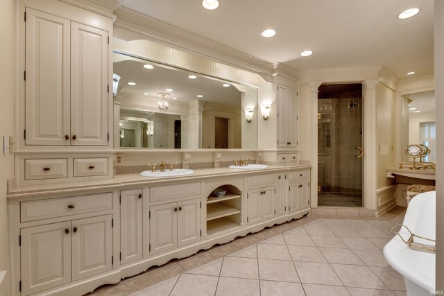 2818 Little Turtle Trl, Fort Wayne, IN 46804 - full bath with recessed lighting, a shower stall, tile patterned flooring, a sink, and crown molding
