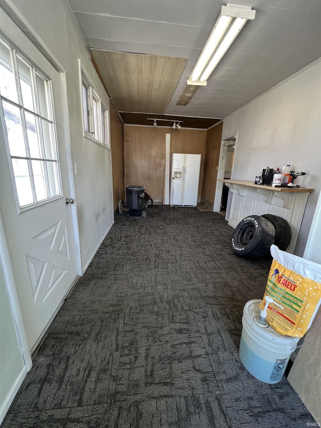 interior space with dark colored carpet