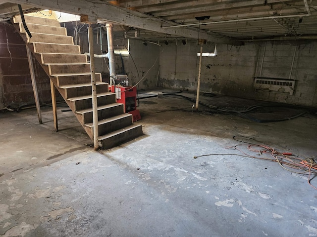 unfinished basement with stairway