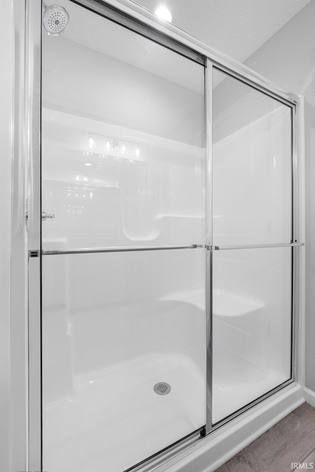 1010 Bryce Cir, Ligonier, IN 46797 - bathroom featuring a shower with door