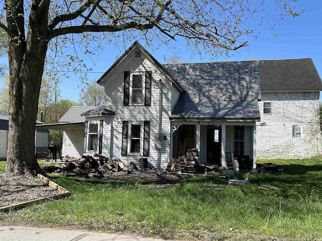 view of front of home with metal roof and covered porch