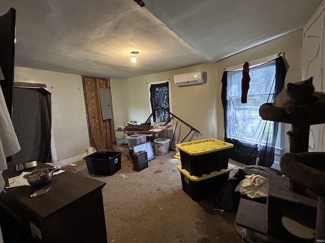 miscellaneous room featuring a wall mounted AC, electric panel, and carpet flooring