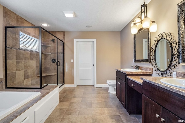 3018 Caradoza Cv, Fort Wayne, IN 46825 - full bathroom with vanity, toilet, baseboards, a shower stall, and a bath