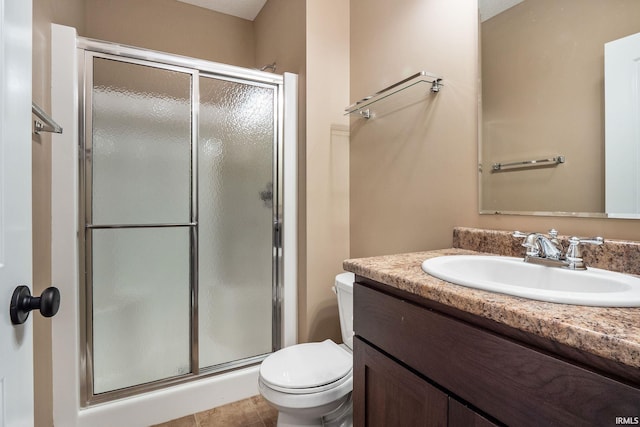 3018 Caradoza Cv, Fort Wayne, IN 46825 - bathroom featuring vanity, a stall shower, and toilet