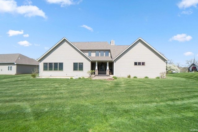 3018 Caradoza Cv, Fort Wayne, IN 46825 - rear view of property with a lawn, a chimney, and roof with shingles