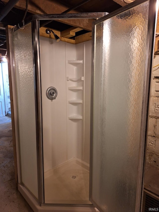 bathroom featuring a stall shower
