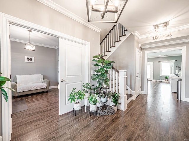 entrance foyer with baseboards, stairs, and dark wood-style flooring