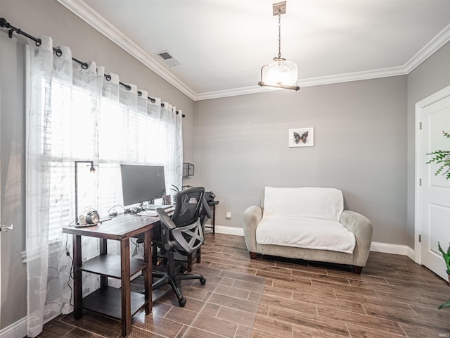 office with wood finished floors, visible vents, crown molding, and baseboards