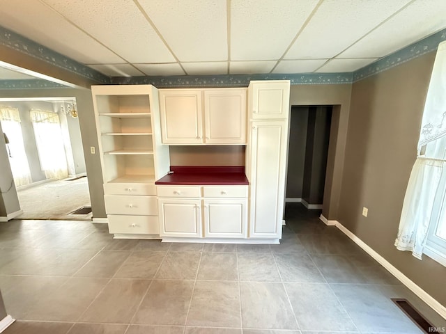 508 E Michigan St, Lagrange, IN 46761 - interior space featuring light tile patterned flooring, a paneled ceiling, visible vents, and baseboards