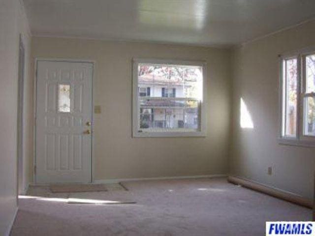 4323 Spatz Ave, Fort Wayne, IN 46806 - carpeted entrance foyer with baseboards