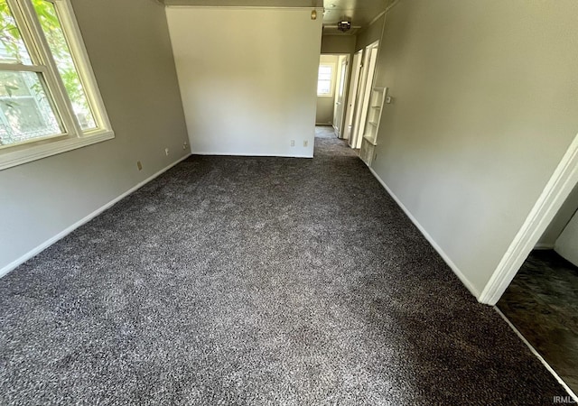 4323 Spatz Ave, Fort Wayne, IN 46806 - spare room featuring dark carpet and baseboards