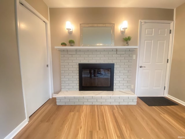 4405 Parkwood Dr, Kokomo, IN 46901 - detailed view of wood finished floors, a fireplace, and baseboards