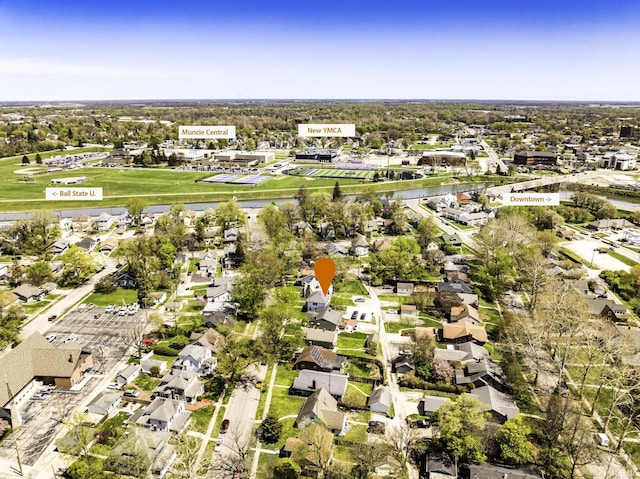 bird's eye view featuring a water view and a residential view