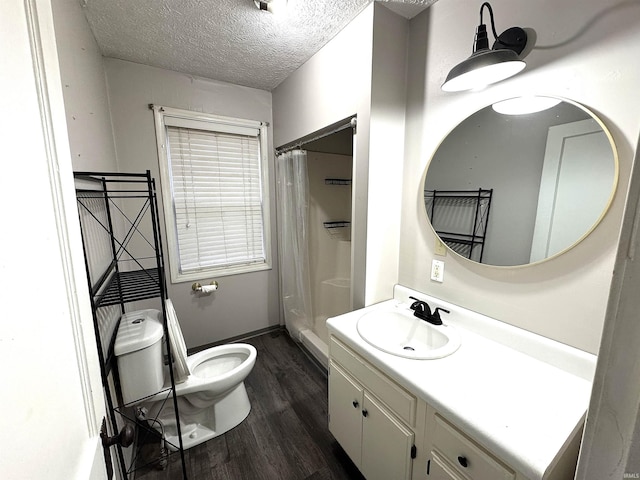 2747 Washington Ave, Bedford, IN 47421 - full bathroom with a textured ceiling, wood finished floors, vanity, toilet, and a shower with shower curtain