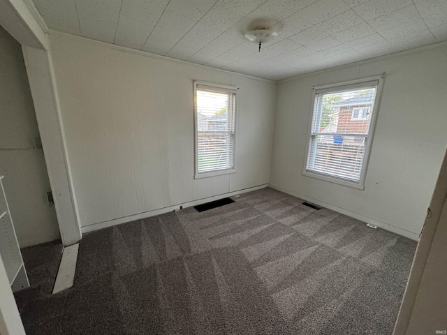 2747 Washington Ave, Bedford, IN 47421 - spare room with carpet floors and visible vents