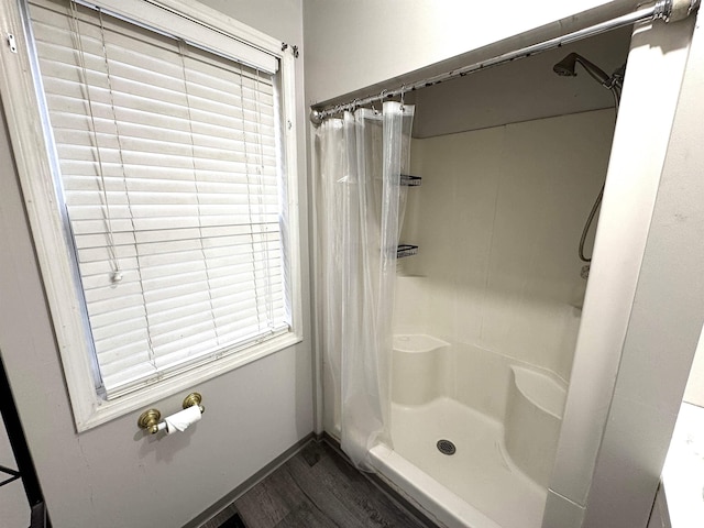 2747 Washington Ave, Bedford, IN 47421 - full bath featuring a stall shower and wood finished floors