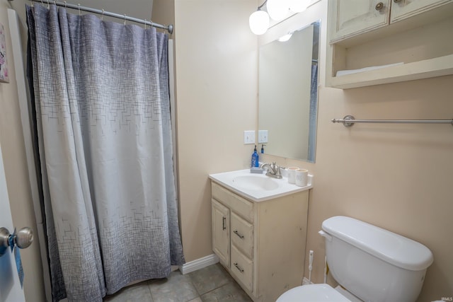 full bath featuring vanity, tile patterned flooring, toilet, and a shower with curtain