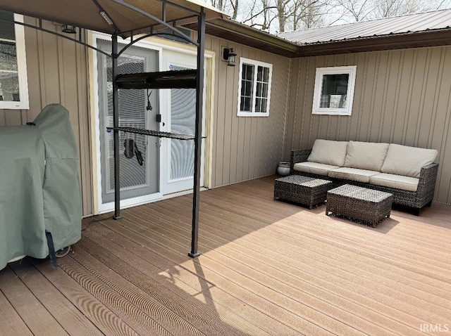wooden deck featuring outdoor lounge area