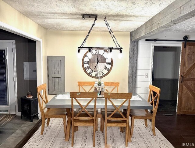 dining area with a barn door