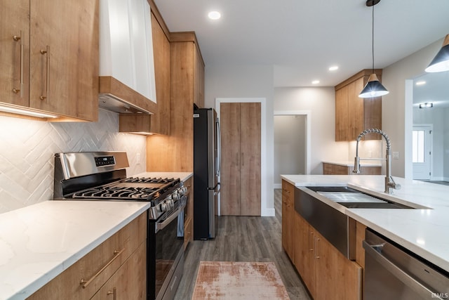 619 Sandringham Pass, Fort Wayne, IN 46845 - kitchen featuring light stone counters, tasteful backsplash, stainless steel appliances, dark wood-style floors, and hanging light fixtures