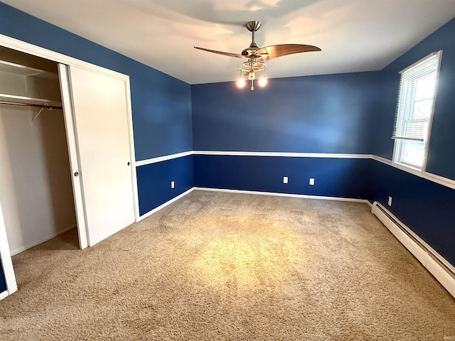 5126 Martinique Rd, Fort Wayne, IN 46815 - unfurnished bedroom featuring a baseboard radiator, ceiling fan, carpet, and a closet
