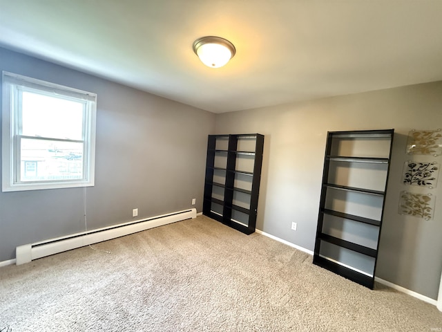 5126 Martinique Rd, Fort Wayne, IN 46815 - carpeted empty room featuring baseboard heating and baseboards