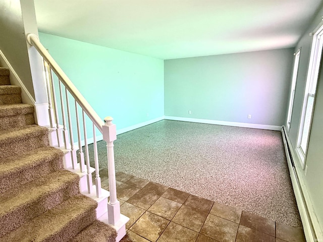 5126 Martinique Rd, Fort Wayne, IN 46815 - staircase featuring carpet flooring, baseboards, and a baseboard radiator