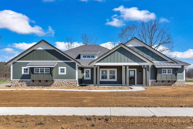 1152 Cascata Trl, Huntertown, IN 46748 - craftsman house with covered porch, board and batten siding, and a shingled roof
