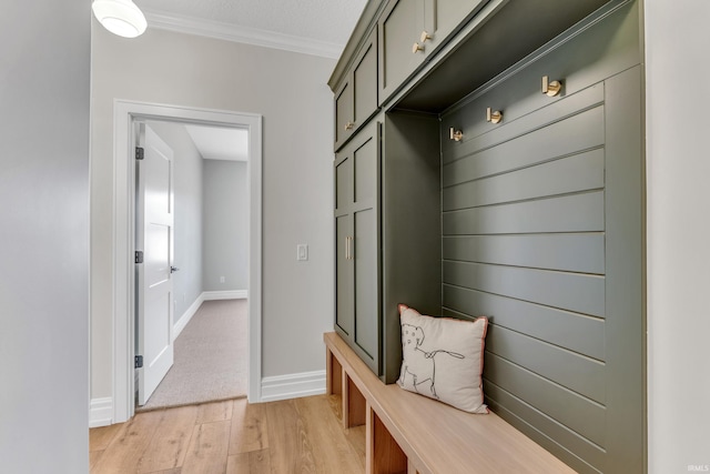 1152 Cascata Trl, Huntertown, IN 46748 - mudroom with light wood-style floors, ornamental molding, and baseboards