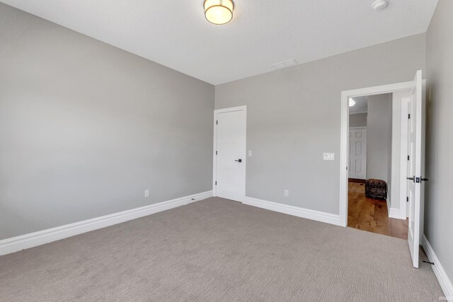 1152 Cascata Trl, Huntertown, IN 46748 - unfurnished bedroom with carpet and baseboards