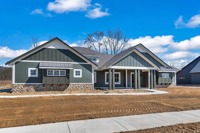 1152 Cascata Trl, Huntertown, IN 46748 - craftsman-style home featuring roof with shingles, board and batten siding, and a porch