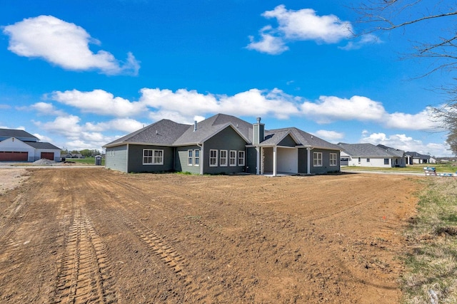 1152 Cascata Trl, Huntertown, IN 46748 - view of front of home featuring a chimney