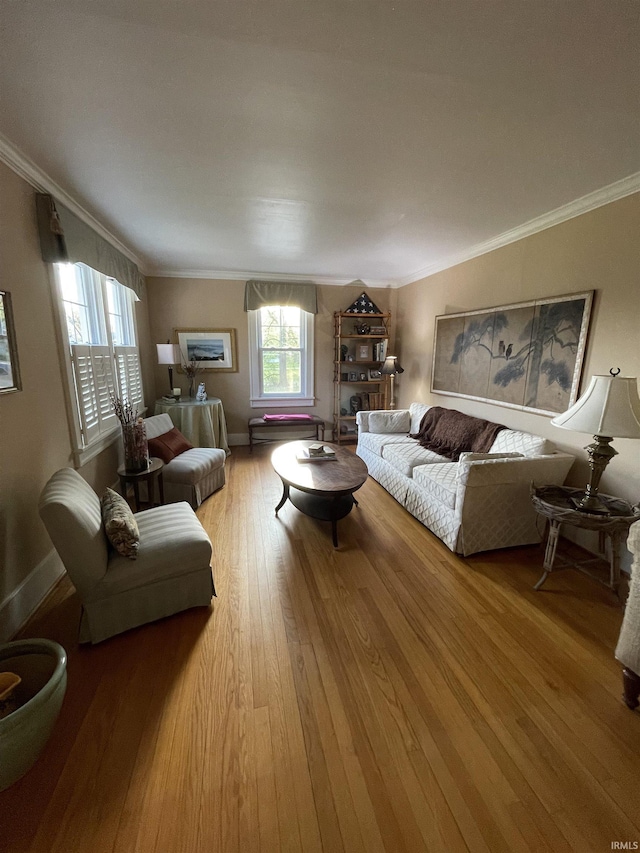 826 College Ave, Culver, IN 46511 - living room featuring wood finished floors, crown molding, and baseboards
