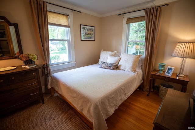 826 College Ave, Culver, IN 46511 - bedroom with crown molding and wood finished floors