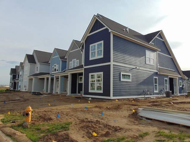 138 Parkerwood Ln, West Lafayette, IN 47906 - view of front facade with board and batten siding and central AC