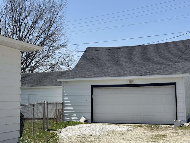 detached garage with fence